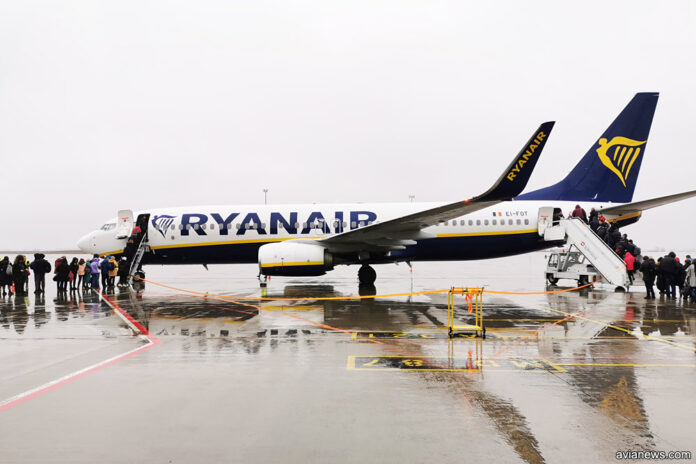 Ryanair 's Boeing 737-800. The passengers board the plane.