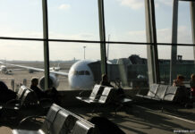A passenger in the airport waiting lounge