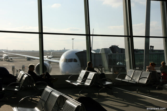 A passenger in the airport waiting lounge