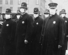 220px-Spanish_flu_in_1918,_Police_officers_in_masks,_Seattle_Police_Department_detail,_from-_165-WW-269B-25-police-l_(cropped).jpg