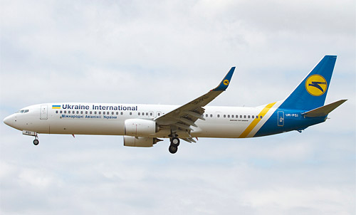 Boeing 737-900ER    .   UR-PSI