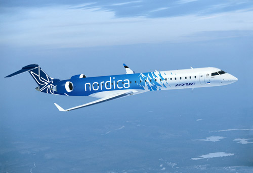Самолет в ливрее Nordica со стрекозой на борту