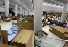 Картонные кровати в зале получения багажа аэропорта Нарита