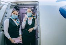 Бортпроводники Air Astana в масках