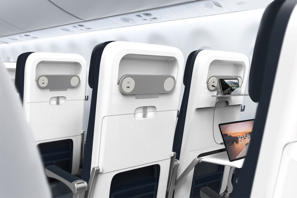 Новые кресла с зарядками и подставкой для телефона в Embraer 190 Air France