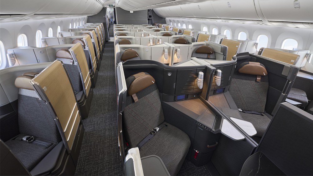 Салон бизнес-класса с каютами Flagship Suite в Boeing 787-9 American Airlines